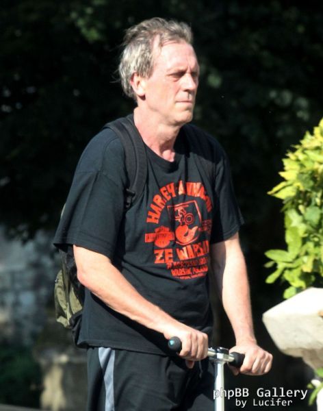 Hugh Laurie on his scooter seen in London July 2018