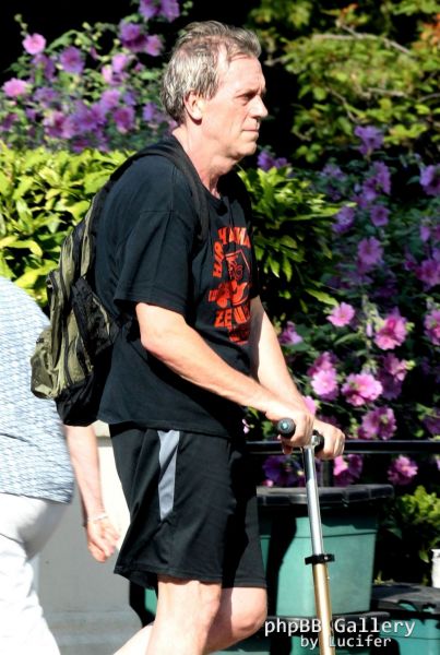 Hugh Laurie on his scooter seen in London July 2018